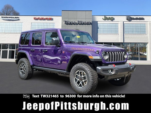 2026 Jeep Wrangler WRANGLER 4-DOOR RUBICON in Reign Exterior Paint — front three-quarter view