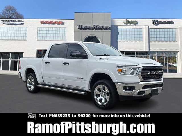 2023 RAM 1500 Big Horn Crew Cab 4x4 5'7' Box in Bright White Clearcoat — front three-quarter view
