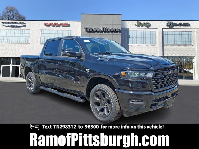 2026 RAM 1500 RAM 1500 BIG HORN CREW CAB 4X4 5'7' BOX in Diamond Black Crystal Pearl-Coat Exterior Paint — front three-quarter view