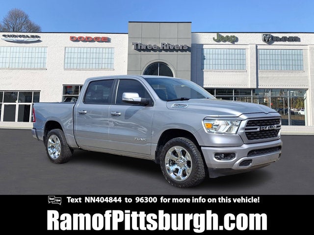 2022 RAM 1500 Big Horn Crew Cab 4x4 5'7' Box in Billet Silver Metallic Clearcoat — front three-quarter view