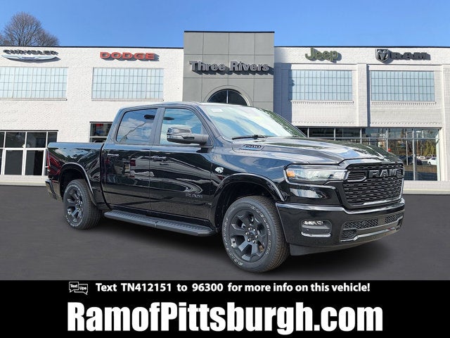 2026 RAM 1500 RAM 1500 LONE STAR CREW CAB 4X4 5'7' BOX in Diamond Black Crystal Pearl-Coat Exterior Paint — front three-quarter view