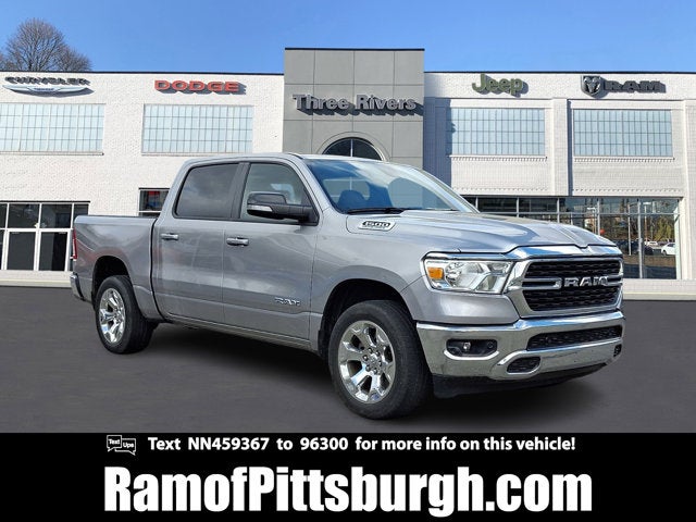 2022 RAM 1500 Big Horn Crew Cab 4x4 5'7' Box in Billet Silver Metallic Clearcoat — front three-quarter view