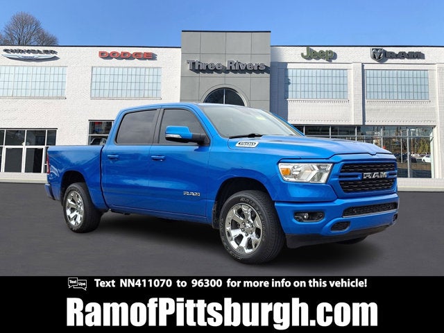2022 RAM 1500 Big Horn Crew Cab 4x4 5'7' Box in Hydro Blue Pearlcoat — front three-quarter view