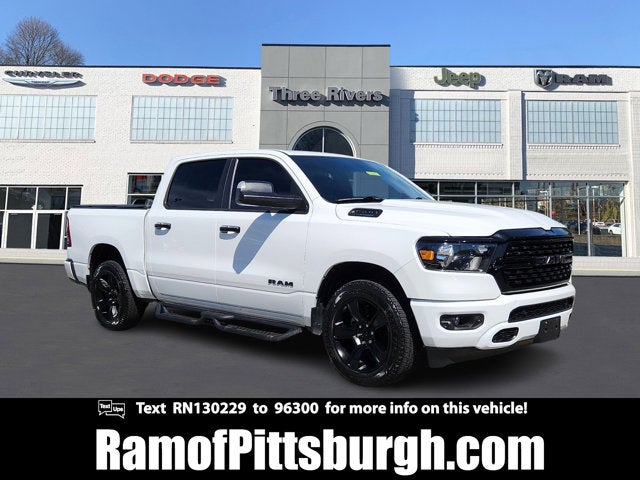 2024 RAM 1500 Big Horn Crew Cab 4x4 5'7' Box in Bright White Clearcoat — front three-quarter view