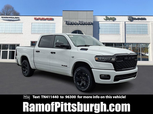 2026 RAM 1500 RAM 1500 BIG HORN CREW CAB 4X4 5'7' BOX in Bright White Clear-Coat Exterior Paint — front three-quarter view