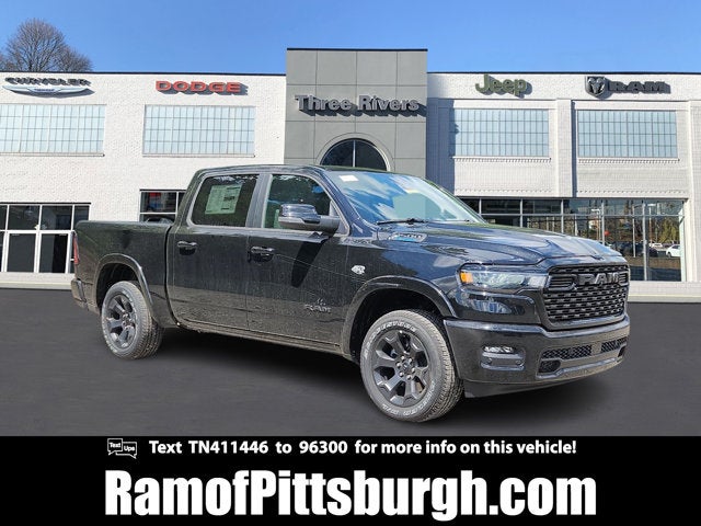 2026 RAM 1500 RAM 1500 BIG HORN CREW CAB 4X4 5'7' BOX in Diamond Black Crystal Pearl-Coat Exterior Paint — front three-quarter view