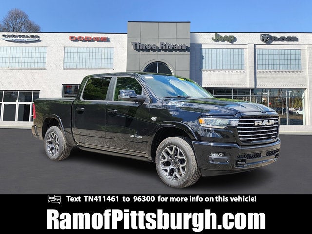 2026 RAM 1500 RAM 1500 LARAMIE CREW CAB 4X4 5'7' BOX in Diamond Black Crystal Pearl-Coat Exterior Paint — front three-quarter view