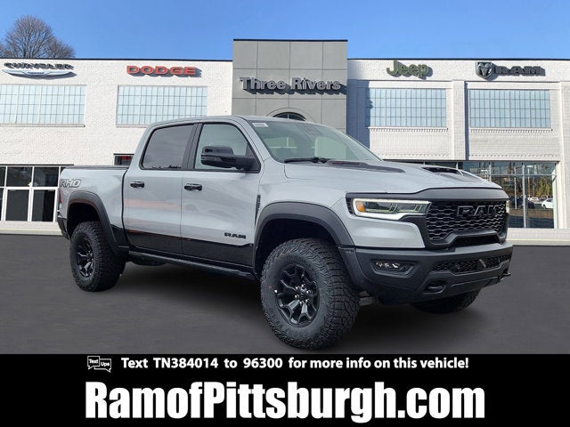 2026 RAM 1500 RAM 1500 RHO CREW CAB 4X4 5'7' BOX in Silver Zynith Exterior Paint — front three-quarter view