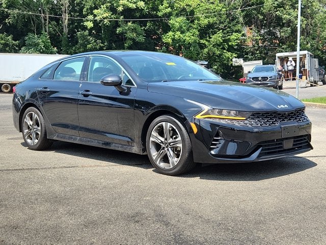 2022 Kia K5 EX in Ebony Black — front three-quarter view